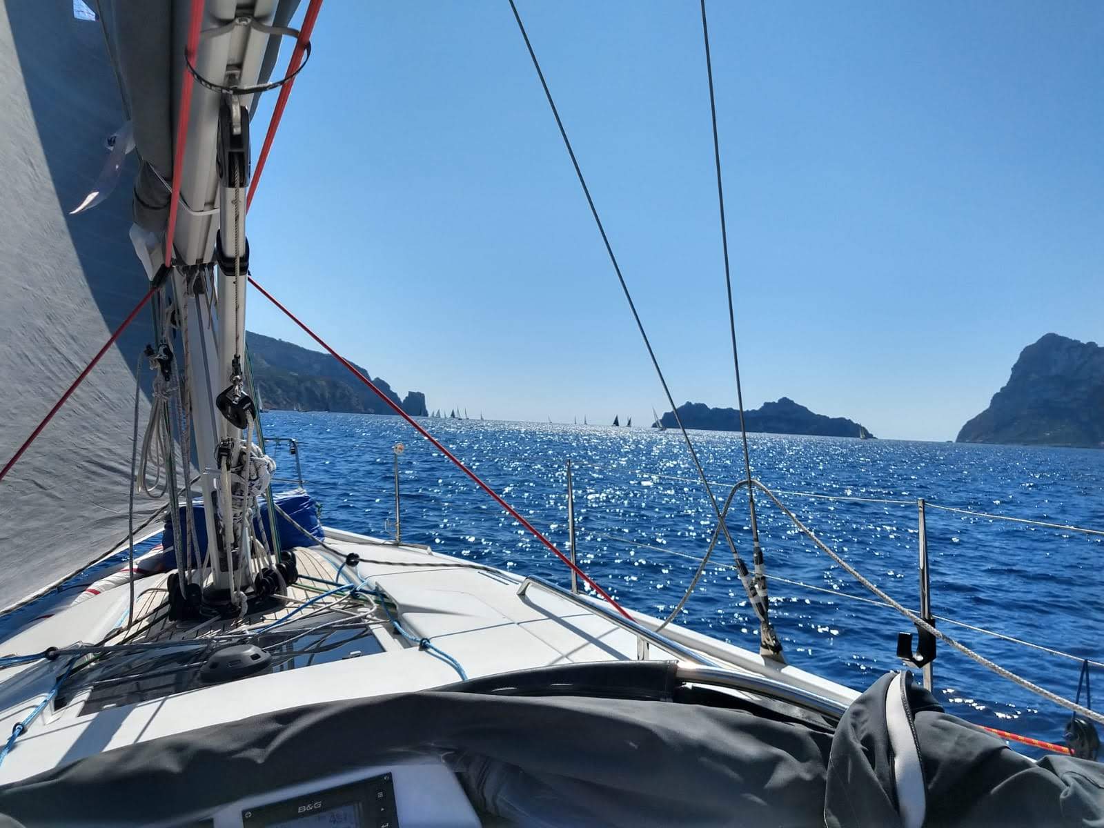 Hands-on sailing practice aboard the school yacht